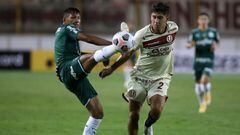 LIMA, PERU - APRIL 21: Rony of Palmeiras competes for the ball with Luis Valverde of Universitario during a match between Universitario and Palmeiras as part of Group A of Copa CONMEBOL Libertadores 2021 at Estadio Monumental on April 21, 2021 in Lima, Pe
