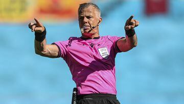 Referee Bjorn Kuipers gestures during the Euro 2020 soccer championship.