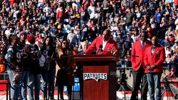 Former defensive tackle Richard Seymour of the New England Patriots at the podium for his hall of fame induction celebration during halftime in the game against the New York Jets at Gillette Stadium on October 24, 2021 in Foxborough, Massachusetts.