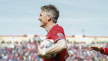 German soccer player Bastian Schweinsteiger (L) celebrates after scoring against the Montreal Impact during the first half of the MLS game at the Toyota Park in Bridgeview, Illinois, USA 