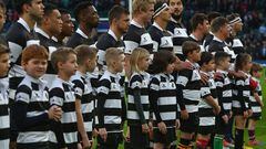 LONDON, ENGLAND - DECEMBER 01: Barbarians Players and Mascots line up for the national anthems prior to the Killick Cup match between Barbarians and Argentina at Twickenham Stadium on December 1, 2018 in London, England. (Photo by Steve Bardens/Getty Images for Barbarians)