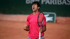 Chile&#039;s Christian Garin celebrates after winning against Australia&#039;s Marc Polmans at the end of their men&#039;s singles second round tennis match on Day 5 of The Roland Garros 2020 French Open tennis tournament in Paris on October 1, 2020. (Photo by MARTIN BUREAU / AFP)