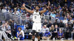 Kyrie Irving of the Brooklyn Nets celebrates after scoring against the Orlando Magic in the first half at Amway Center on March 15, 2022 in Orlando, Florida. 