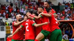 Morocco's defender #2 Achraf Hakimi (2L) celebrates with teammates after scoring his team's first goal during the Africa Cup of Nations (CAN) 2024 group F football match between Morocco and DR Congo at Stade Laurent Pokou in San Pedro on January 21, 2024. (Photo by SIA KAMBOU / AFP)