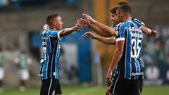 PORTO ALEGRE, BRAZIL - MARCH 10: Guilherme Azevedo of Gremio celebrates with teammates after scoring the fifth goal of his team during a first leg match of second stage of Copa CONMEBOL Libertadores 2021 between Gremio and Ayacucho at Arena do Gremio on M