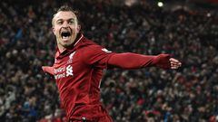Liverpool&#039;s Swiss midfielder Xherdan Shaqiri celebrates after scoring their third goal during the English Premier League football match between Liverpool and Manchester United at Anfield in Liverpool, north west England on December 16, 2018. (Photo b
