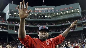 FILE - In this Oct. 10, 2016, file photo, Boston Red Sox&#039;s David Ortiz waves from the field at Fenway Park after Game 3 of baseball&#039;s American League Division Series against the Cleveland Indians in Boston. Officials say Ortiz, who was shot in the Dominican Republic on June 9, 2019, at an outdoor cafe, was the victim of incompetent criminals who were trying to kill a man next to him. (AP Photo/Charles Krupa, File)