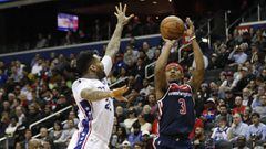 Jan 9, 2019; Washington, DC, USA; Washington Wizards guard Bradley Beal (3) shoots the ball as Philadelphia 76ers forward Wilson Chandler (22) defends in the fourth quarter at Capital One Arena. The Wizards won 123-106. Mandatory Credit: Geoff Burke-USA TODAY Sports