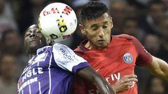 Toulouse&#039;s Guinean defender Issiaga Sylla (L) and Paris Saint-Germain&#039;s Brazilian defender Marquinhos go for a header during the French L1 football match Toulouse (TFC) vs Paris Saint-Germain (PSG) on September 23, 2016 at the Municipal stadium in Toulouse.  / AFP PHOTO / PASCAL PAVANI