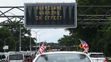 A road sign flashes a hurricane warning on Southern State Parkway on the eve of landfall by Hurricane Henri on August 21, 2021 in Valley Stream, New York. 