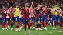 Atletico Madrid's French forward #07 Antoine Griezmann and teammates celebrate their victory at the end of the Spanish Liga football match between Club Atletico de Madrid and Real Madrid CF at the Metropolitano stadium in Madrid on September 24, 2023. (Photo by Thomas COEX / AFP)