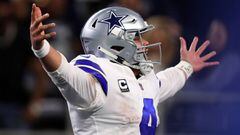 ARLINGTON, TEXAS - JANUARY 05: Dak Prescott #4 of the Dallas Cowboys gestures after scoring a touchdown against the Seattle Seahawks in the fourth quarter during the Wild Card Round at AT&amp;T Stadium on January 05, 2019 in Arlington, Texas.   Tom Pennin