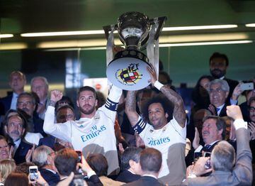 Sergio Ramos and Marcelo lift the LaLiga trophy before Real Madrid's league clash with Valencia on Sunday evening.