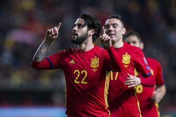 Isco celebrates after scoring Spain's fourth goal at El Molinón.