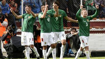 Bolivia&#039;s players celebrate after scoring against Argentina during their 2018 FIFA World Cup qualifier football match in  La Paz on March 28, 2017.