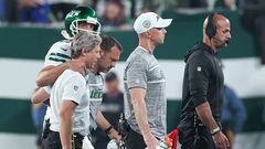 Sep 11, 2023; East Rutherford, New Jersey, USA; Medical staff help New York Jets quarterback Aaron Rodgers (8) off the field head behind coach Robert Saleh during the first half against the Buffalo Bills at MetLife Stadium. Mandatory Credit: Vincent Carchietta-USA TODAY Sports