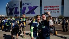 Fans arrive at the University of Phoenix Stadium for Super Bowl XLIX between the Seahawks and Patriots.