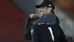 Soccer Football - Premier League - Liverpool v Crystal Palace - Anfield, Liverpool, Britain - June 24, 2020  Liverpool manager Juergen Klopp celebrates with Alisson after the match, as play resumes behind closed doors following the outbreak of the coronav