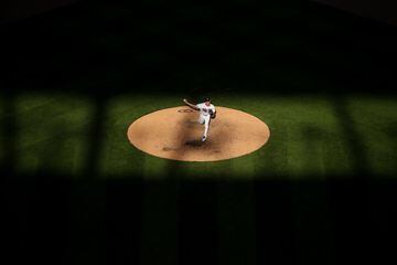 Cole Sands delivers a pitch against the Houston Astros in the eighth inning of game two of a doubleheader at Target Field.   David Berding/Getty Images/AFP