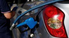 A fuel nozzle fills a car at a gas station in Valparaiso, Chile March 22, 2022. 