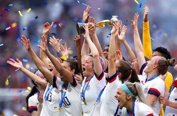 Megan Rapinoe of the USA lifts the Women's World Cup trophy after her side's final win over the Netherlands on Sunday.