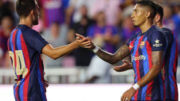 FORT LAUDERDALE, FLORIDA - JULY 19: Raphinha #22 (R) and Eric Garcia #24 of FC Barcelona celebrate their first goal by Pierre-Emerick Aubameyang #17 during the first half of a preseason friendly against Inter Miami CF at DRV PNK Stadium on July 19, 2022 in Fort Lauderdale, Florida. (Photo by Michael Reaves/Getty Images)