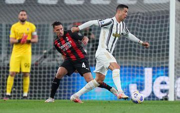 09 May 2021, Italy, Turin: Juventus' Cristiano Ronaldo and Milan's Ismael Bennacer battle for the ball during the Italian Serie A soccer match between Juventus an AC Milan at the Allianz Stadium.