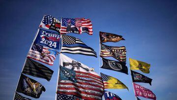Flags flown by supporters of former US President Donald Trump are shown ahead of a rally featuring Trump at the Arnold Palmer Regional Airport November 5, 2022 in Latrobe, Pennsylvania.