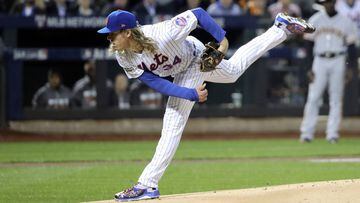Oct 5, 2016; New York City, NY, USA; New York Mets starting pitcher Noah Syndergaard (34) throws during the first inning against the San Francisco Giants in the National League wild card playoff baseball game at Citi Field. Mandatory Credit: Anthony Grupp