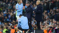 Erling Haaland is treated by the Manchester City medical services during the match against Aston Villa.