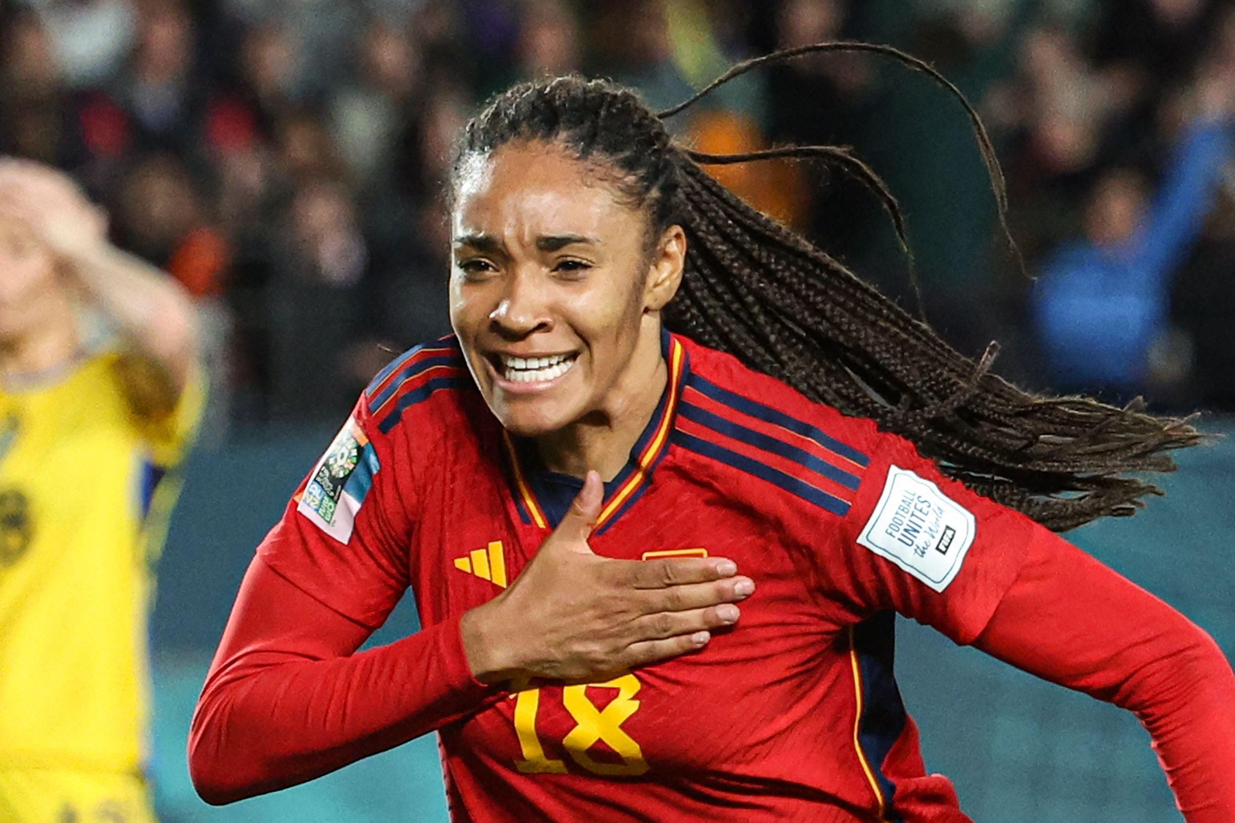 Spain's forward #18 Salma Paralluelo celebrates scoring her team's first goal during the Australia and New Zealand 2023 Women's World Cup semi-final football match between Spain and Sweden at Eden Park in Auckland on August 15, 2023. (Photo by Marty MELVILLE / AFP)