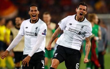 Virgil Van Dijk (L) and Dejan Lovren of Liverpool celebrate their semi final win at full time during the UEFA Champions League Semi Final Second Leg match between A.S. Roma and Liverpool at Stadio Olimpico on May 2, 2018 in Rome, Italy. (Photo by Julian F