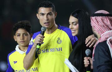 Portuguese forward Cristiano Ronaldo (C-L), accompanied by his partner Georgina Rodriguez 
