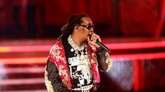 (FILES) In this file photo taken on June 24, 2018, US rapper Takeoff, of Migos, performs onstage at the 2018 BET Awards at Microsoft Theater in Los Angeles, California. - The rapper Takeoff, a member of the Grammy-nominated hip hop trio Migos, was fatally shot at a bowling alley in Houston, Texas, on November 1, 2022, according to entertainment outlet TMZ. He was 28 years old. (Photo by Leon Bennett / GETTY IMAGES NORTH AMERICA / AFP)