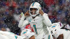 ORCHARD PARK, NEW YORK - DECEMBER 17: Tua Tagovailoa #1 of the Miami Dolphins signals at the line of scrimmage against the Buffalo Bills during the fourth quarter at Highmark Stadium on December 17, 2022 in Orchard Park, New York.   Bryan M. Bennett/Getty Images/AFP (Photo by Bryan M. Bennett / GETTY IMAGES NORTH AMERICA / Getty Images via AFP)