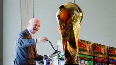 FIFA president Gianni Infantino speaks at FIFA/Frito Lay news conference ahead of 2026 World Cup while the Official FIFA World Cup Trophy is displayed in New York City, New York, U.S., June 17, 2022.