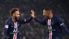 (FILES) In this file photo taken on December 04, 2019 Paris Saint-Germain&#039;s Brazilian forward Neymar (L) is congratulated by Paris Saint-Germain&#039;s French forward Kylian Mbappe after scoring his team&#039;s first goal during the French L1 footbal