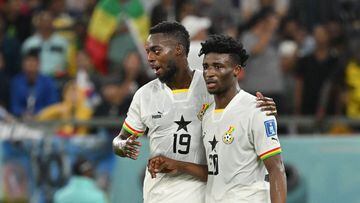 Ghana's midfielder #20 Mohammed Kudus (R) celebrates scoring his team's third goal with Ghana's forward #19 Inaki Williams during the Qatar 2022 World Cup Group H football match between South Korea and Ghana at the Education City Stadium in Al-Rayyan, west of Doha, on November 28, 2022. (Photo by JUNG Yeon-je / AFP)