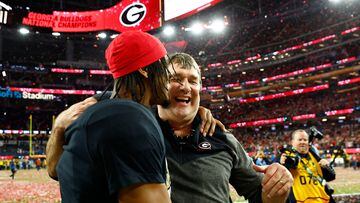 INGLEWOOD, CALIFORNIA - JANUARY 09: Head coach Kirby Smart of the Georgia Bulldogs celebrates with Kenny McIntosh #6 after defeating the TCU Horned Frogs in the College Football Playoff National Championship game at SoFi Stadium on January 09, 2023 in Inglewood, California. Georgia defeated TCU 65-7.   Ronald Martinez/Getty Images/AFP (Photo by RONALD MARTINEZ / GETTY IMAGES NORTH AMERICA / Getty Images via AFP)