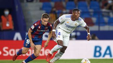 VALENCIA, SPAIN - AUGUST 22: Jorge De Frutos of Levante UD competes for the ball with David Alaba of Real Madrid CF during the La Liga Santander match between Levante UD and Real Madrid CF at Ciutat de Valencia Stadium on August 22, 2021 in Valencia, Spai