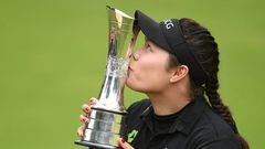 WOBURN, ENGLAND - JULY 31:  Ariya Jutanugarn of Thailand kisses the trophy following her victory during the final round of the Ricoh Women&#039;s British Open at Woburn Golf Club on July 31, 2016 in Woburn, England.  (Photo by Tom Dulat/R&amp;A/R&amp;A vi