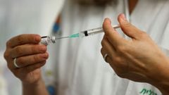 A medical worker prepares to administer a dose of a vaccine against the coronavirus disease (COVID-19) as Israel urged more 12- to 15-year-olds to be vaccinated, citing new outbreaks attributed to the more infectious Delta variant, at a Clalit healthcare 