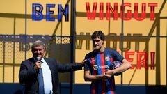 Barcelona's Spanish President Joan Laporta (L) speaks next to FC Barcelona's Spanish defenders Marcos Alonso during his official presentation in Barcelona on September 6, 2022, on the eve of their UEFA Champions League, group C, first leg football match between FC Barcelona and FC Viktoria Plzen. (Photo by Josep LAGO / AFP)