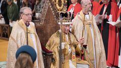 King Charles III is crowned with St Edward's Crown by The Archbishop of Canterbury the Most Reverend Justin Welby during his coronation ceremony in Westminster Abbey, London. Picture date: Saturday May 6, 2023.  Jonathan Brady/Pool via REUTERS