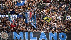 Milan's supporters cheer during the Italian Serie A football match between Inter Milan and Fiorentina at San Siro stadium in Milan on September 3, 2023. (Photo by Isabella BONOTTO / AFP)