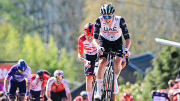 UAE Team Emirates' Slovenian rider Tadej Pogacar cycles to cross the finish line during the 86th edition of the men's race 'La Fleche Wallonne', a one day cycling race (Waalse Pijl - Walloon Arrow), 194,2 km from Herve to Huy on April 19, 2023. (Photo by DIRK WAEM / Belga / AFP) / Belgium OUT