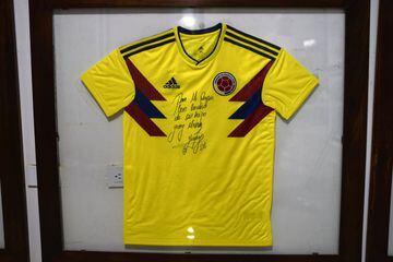 A jersey signed and dedicated to his father is displayed at Colombian national football team player Yerry Mina's foundation in his hometown Guachené