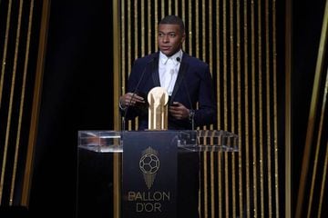 Kopa this! Kylian Mbappe presents the Kopa Trophy during the 2019 Ballon D'Or Ceremony.