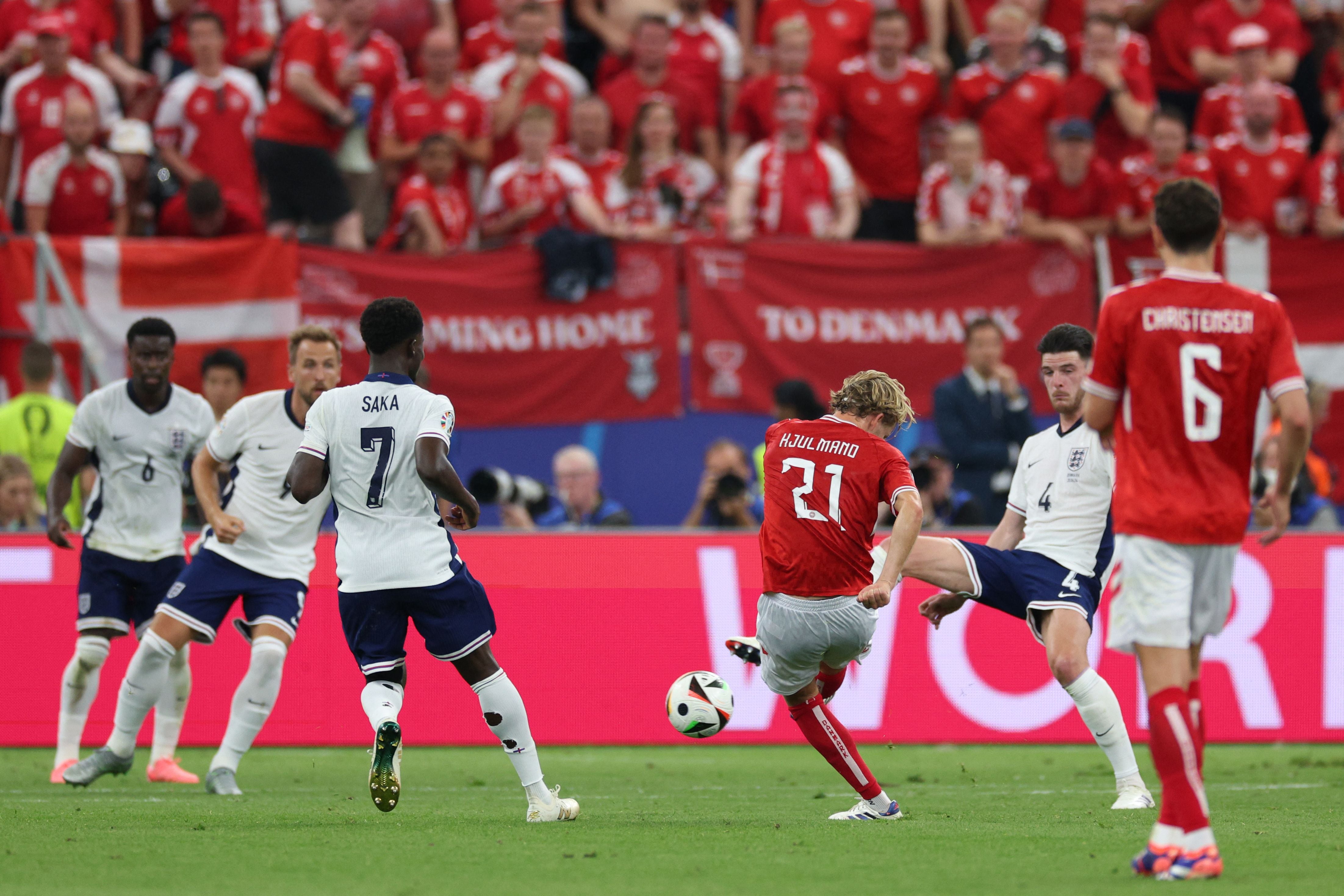 Denmark's midfielder #21 Morten Hjulmand scores his team's first goal during the UEFA Euro 2024 Group C football match between Denmark and England at the Frankfurt Arena in Frankfurt am Main on June 20, 2024. (Photo by Adrian DENNIS / AFP)