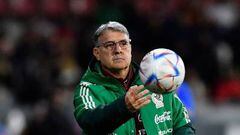 Mexico's Argentinian headcoach Gerardo 'Tata' Martino hands a ball during the friendly football match between Mexico and Sweden, at the Montilivi stadium in Girona on November 16, 2022. (Photo by Pau BARRENA / AFP) (Photo by PAU BARRENA/AFP via Getty Images)